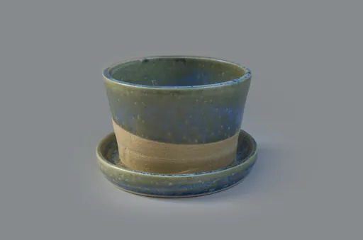 Green plant pot with saucer